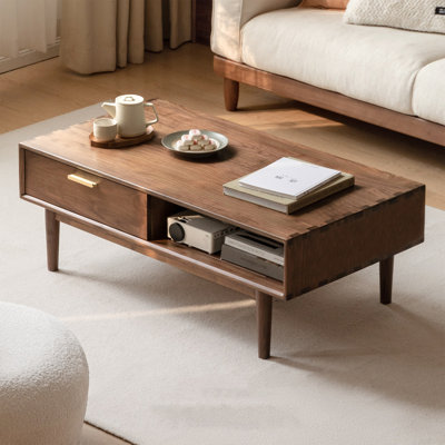 Table basse moderne et minimaliste en bois massif avec rangement