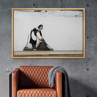 Banksy Maid Sweeping Under Tapis sur toile