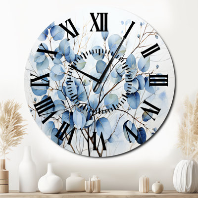 Horloge murale bleue et grise avec feuilles sur une branche III