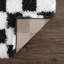 Tapis noir / blanc Atiray-87332708