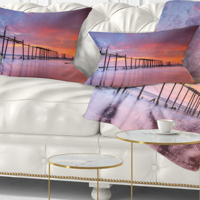 Seascape de piliers en bois avec coussin de soleil