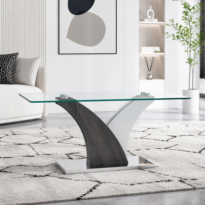 Table basse rectangulaire en verre avec piètement artistique