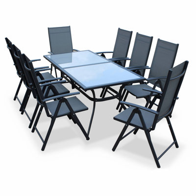 Rashid 8 - Person Patio Dining Set with Rectangular Table , Cushions Included