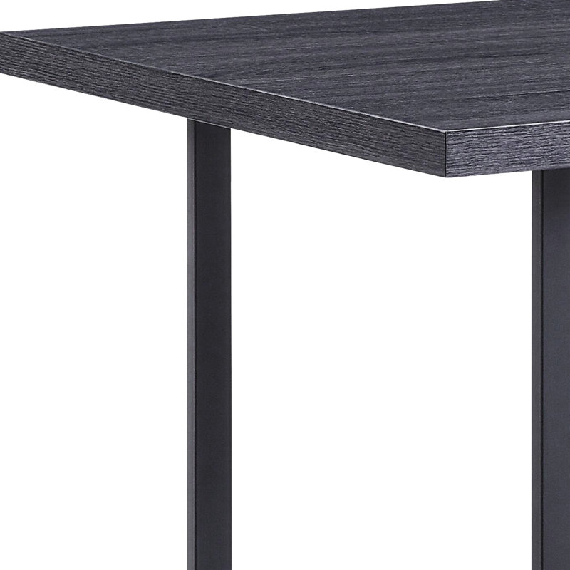 Table de salle à manger rectangulaire en chêne gris et noir, avec piètement traîneau stable pour une table durable et élégante pour toutes les occasions.