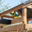 Backyard Discovery Endeavor II Cedar Swing Set with 10 ft. Wave Slide, Web Disc Swing & Double Rock Wall