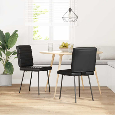  2 chaises de salle à manger en similicuir noir