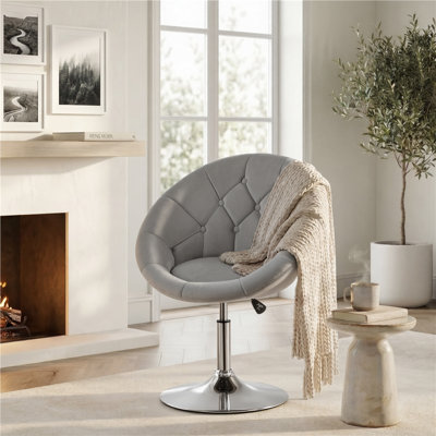 Fauteuil demi-tonneau pivotant capitonné Mavin