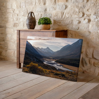 Canvas A Serene Valley Landscape At Sunrise Featuring A Winding River Wall Art Reflecting Soft Golden Light Surrounded By Rugged Canvas Wall Art