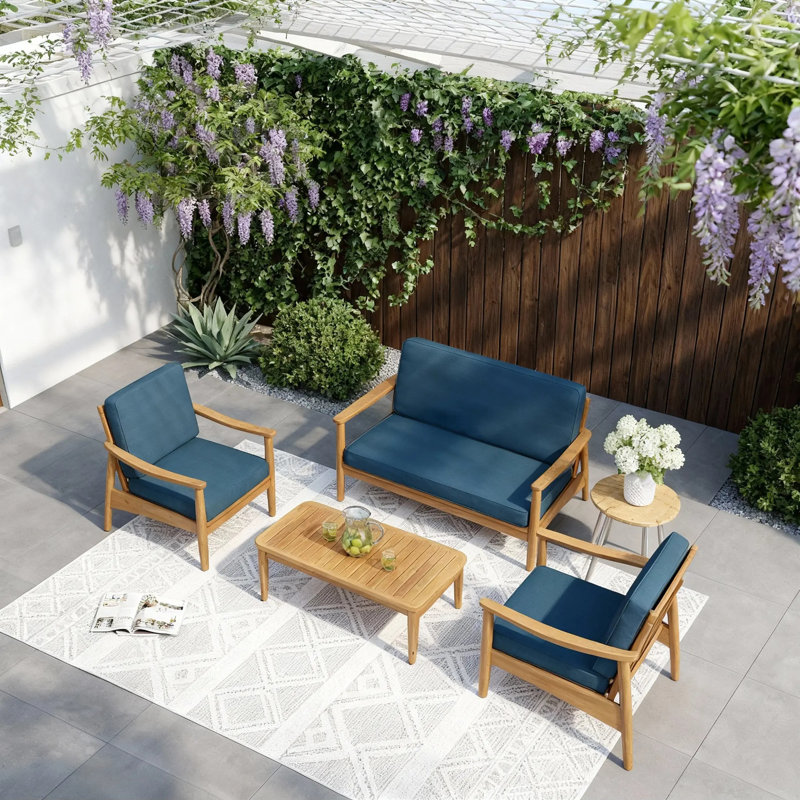 Ensemble de patio en bois d'acacia 4 pièces avec coussins bleu sarcelle foncé