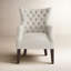Fauteuil d'appoint à oreilles capitonné Hannah-678900782