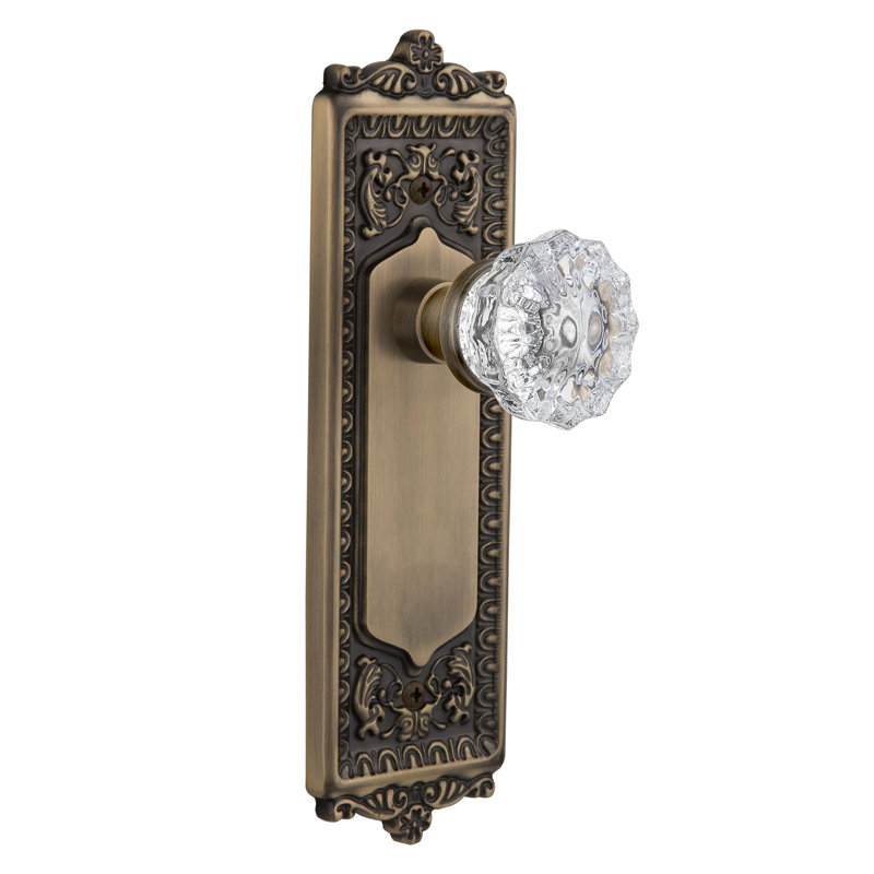 Egg & Dart Plate with Decorative Keyhole and Crystal Door Knob, Antique Brass, 2-3/8"