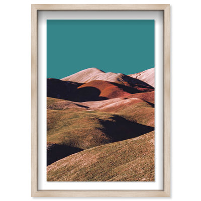 Mountains over turquoise sky Framed Graphic Art