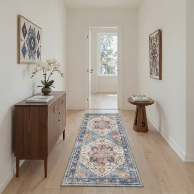 Tapis performance d'intérieur bleu / orange Astra, lavable à la machine, avec envers antidérapant