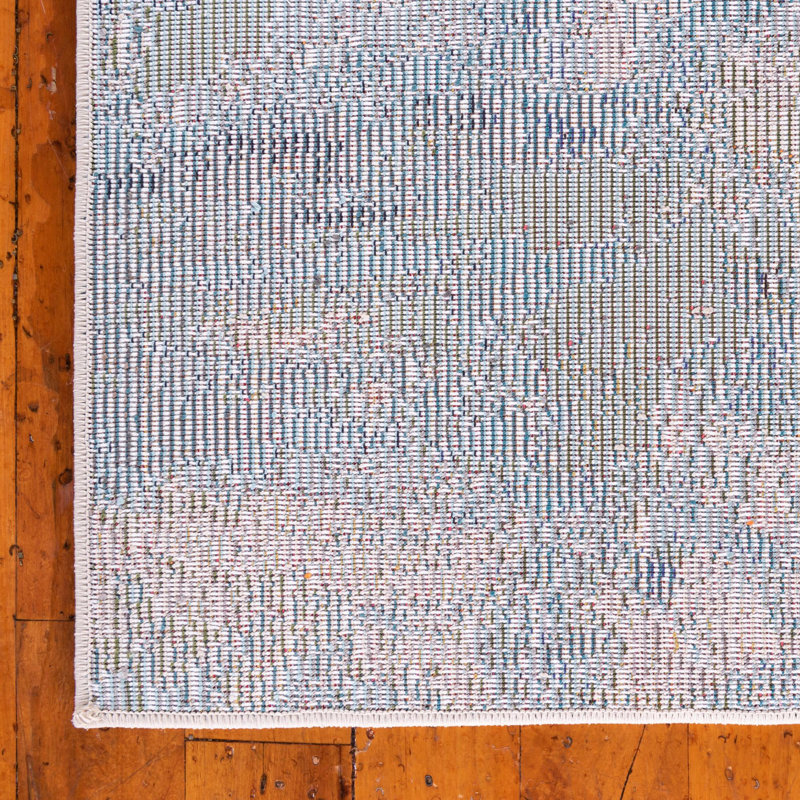 Tapis bleu clair tissé à la machine à motif abstrait Keimar, Rectangle 4 pi 1 po x 6 pi 1 po