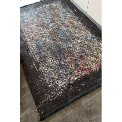 Tapis noir à rayures géométriques multicolores lavable à la machine