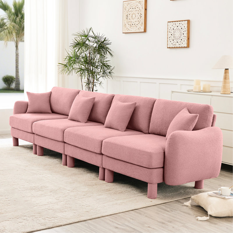 Canapé rose à 4 places en tissu bouclé avec construction et configuration de siège souple pour une utilisation régulière