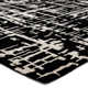 Brannon Abstract Handmade Tufted Black Area Rug