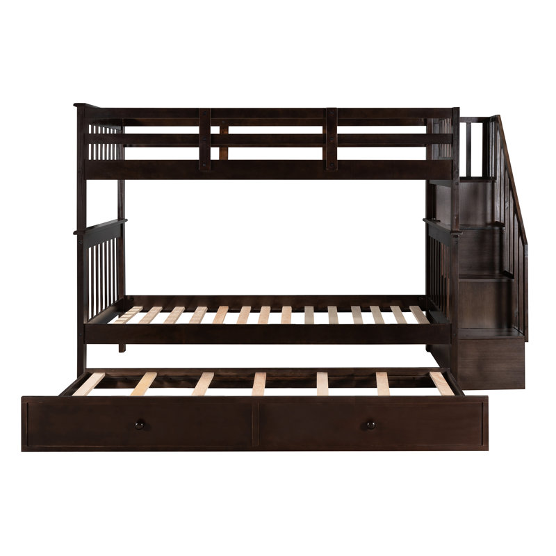 Lit superposé Twintwin avec lit gigogne utile pour chambre à coucher et dortoir. Structure en bois massif pour une utilisation à long terme. Quatre compartiments de rangement. Accès sécuritaire à l'escalier. Conception polyvalente, pouvant être divisée en deux lits. Sans boîte