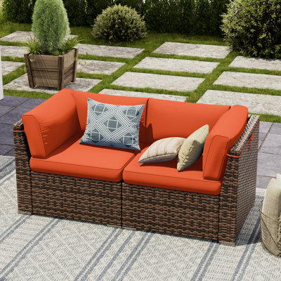2 Piece Rattan Sectional Seating Group With Cushions