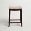 Tabouret de comptoir et de bar en bois massif sans dossier avec siège rembourré Bartonville-866721029-844602782