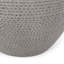 Table d'appoint moderne en bÃ©ton lÃ©ger, avec surface texturÃ©e et design cylindrique arrondi et effilÃ©, conÃ§ue pour l'extÃ©rieur