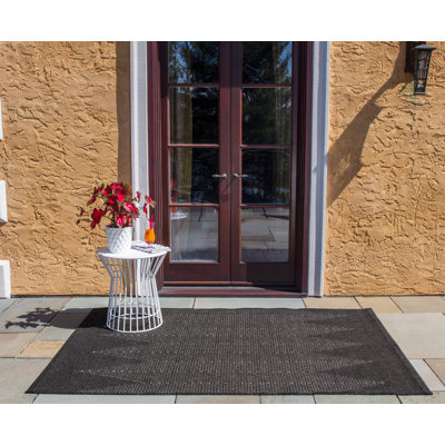 Tapis d'intérieur / extérieur à motif de chevrons gris anthracite Antigua
