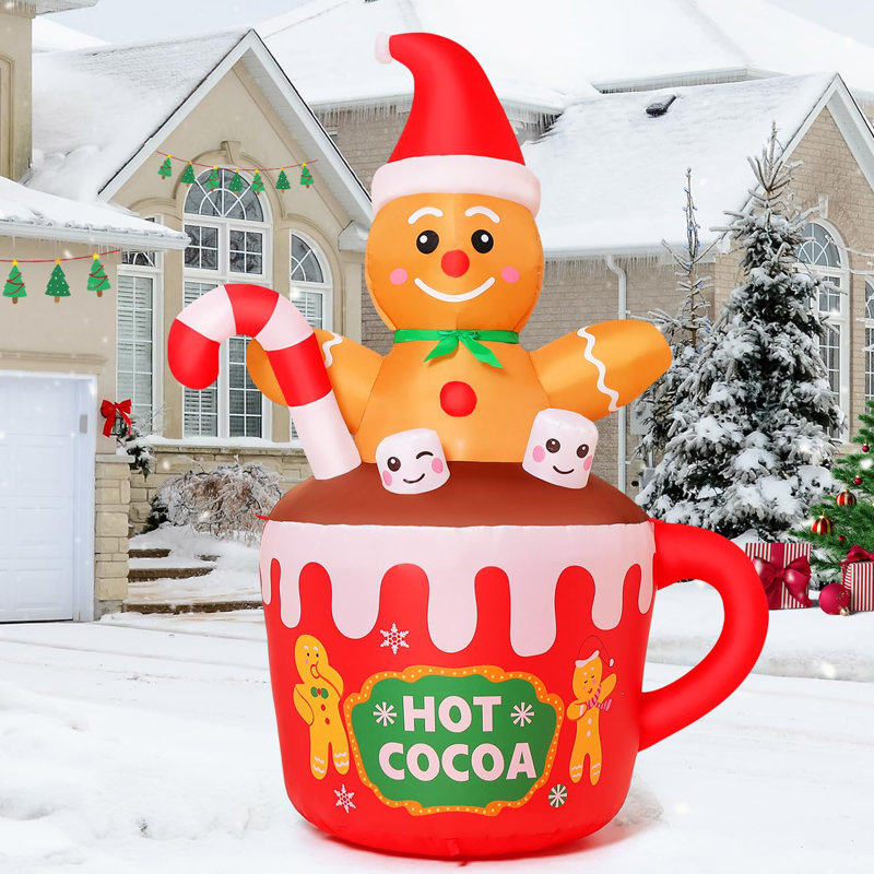 Bonhomme de pain gonflable de Noël de 6 pi GOOSH assis dans une tasse de cacao chaud avec des DEL intégrées
