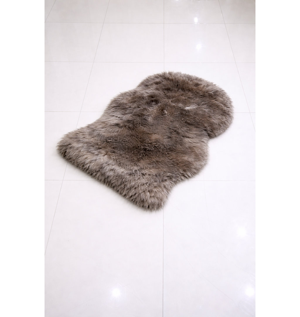 Oval Solid Colour Sheepskin 60cm X 110cm Area Rug