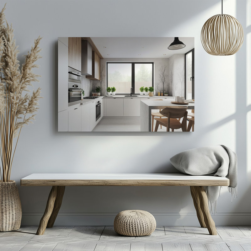 Toile, une cuisine scandinave moderne avec des armoires blanches épurées et un art mural minimaliste accentué par des éléments en bois naturel