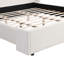 Élégant lit tapissier en tissu blanc avec tête de lit haute alliant simplicité moderne et confort luxueux, très grand-121090099