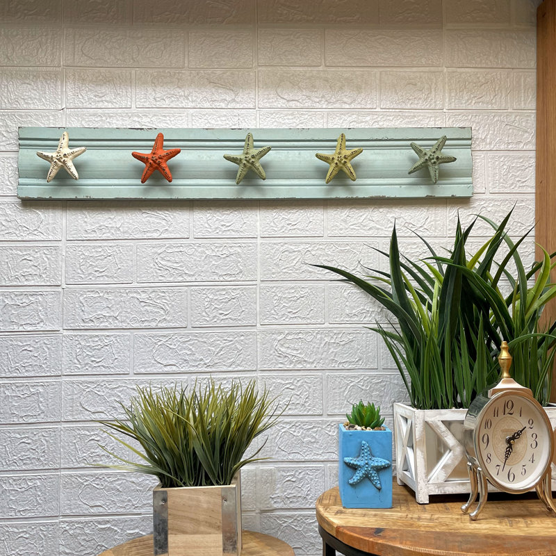 Porte-manteau mural en forme d'étoile de mer côtière, avec 5 crochets en fonte sur support en bois, 80 cm de large