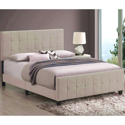 Grand lit à panneau tapissier beige capitonné