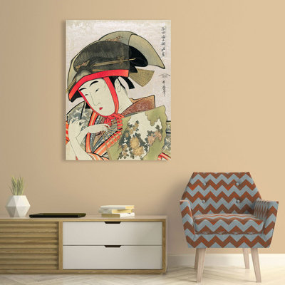 Woman Holding a Fan Wearing a Traditional Transparent Hat by Utamaro Kitagawa - Wrapped Canvas Painting