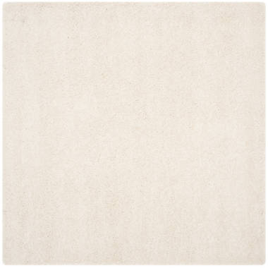 Charvik Solid Color Handmade Area Rug in Ivory