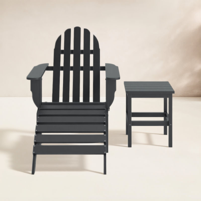 Chaise Adirondack pliante en plastique / résine avec table et repose-pieds Leighton, Noir
