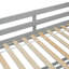 Lit simple superposé au dessus d'un lit double avec glissade, escalier de rangement et garde-corps de sécurité-436673988