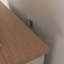 Armoire de rangement polyvalente à plusieurs niveaux avec tablettes réglables, tiroir central et section centrale ouverte pour organiser les cuisines modernes