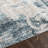 Stuckey Abstract Machine Woven Blue/White Area Rug-2001704651