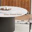 Ensemble de table de salle à manger moderne 59 po avec 6 chaises, table en pierre frittée blanc brillant avec pieds en bois noir, chaises en similicuir
