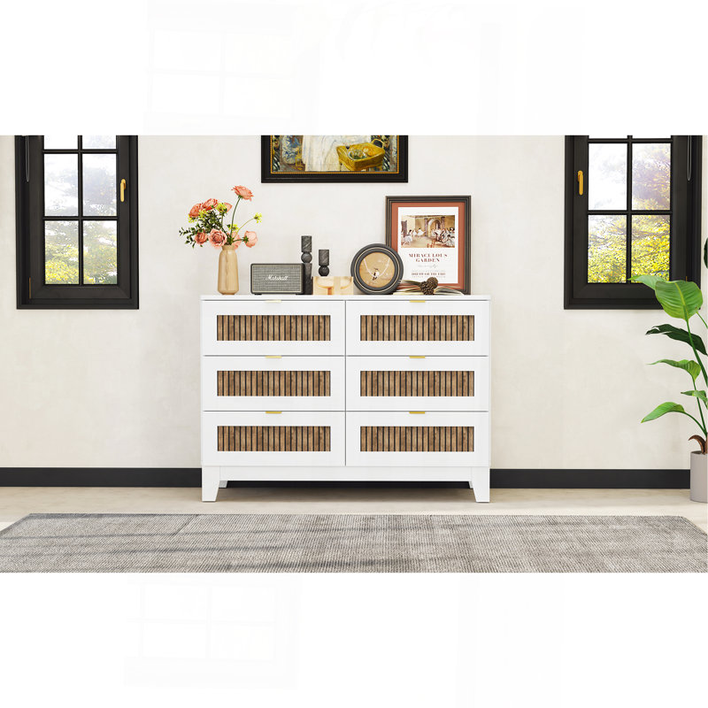 Charming Wooden Dresser With Six Drawers And Metal Handles, A Stylish And Practical Bedroom Storage Solution.