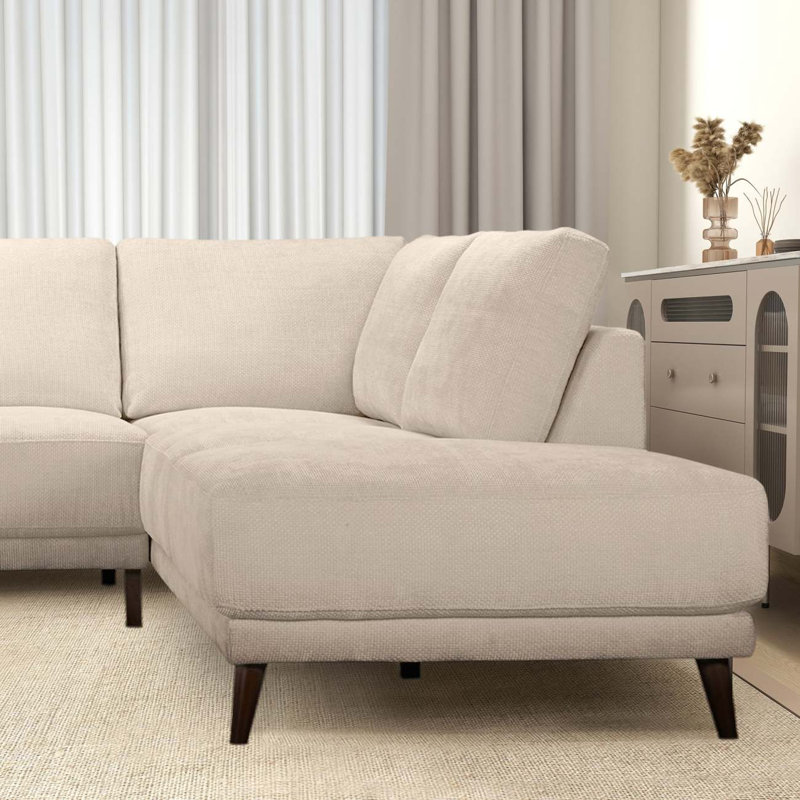 Canapé modulaire crème avec repose-pieds