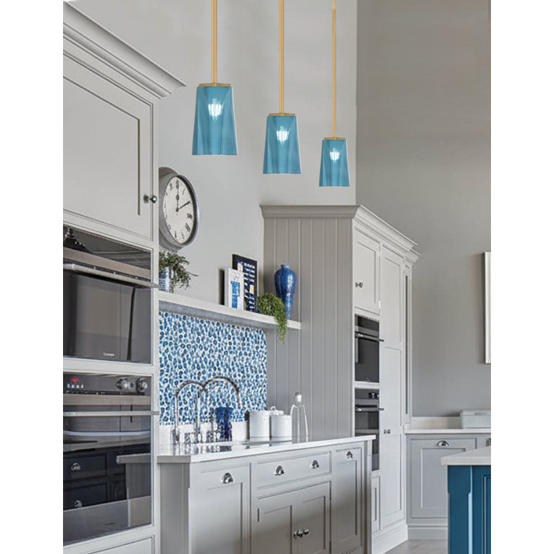 Suspension Annora Stem Hung Mini présentée en finition laiton New Age avec verre dégradé bleu de 11,4 cm de large x 16,5 cm de hauteur