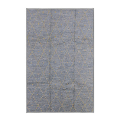 Tapis bleu à motif géométrique
