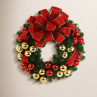 Holiday Evergreen Wreath with Gold and Red Ornaments and Red and Gold Bow