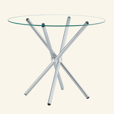 Une table ronde circulaire en verre trempé transparent d'un diamètre de 36,6 pouces, avec des pieds en métal froncés en forme d'anneau. Le verre du bureau a une épaisseur de 0,3 pouce.