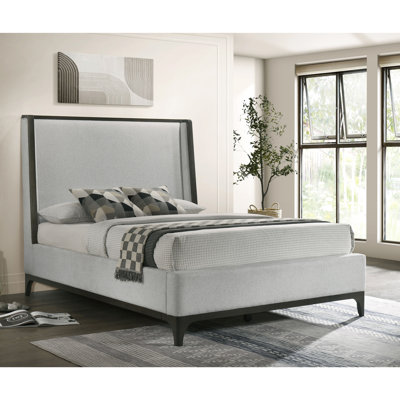 Kloss Upholstered Wingback Platform Bed