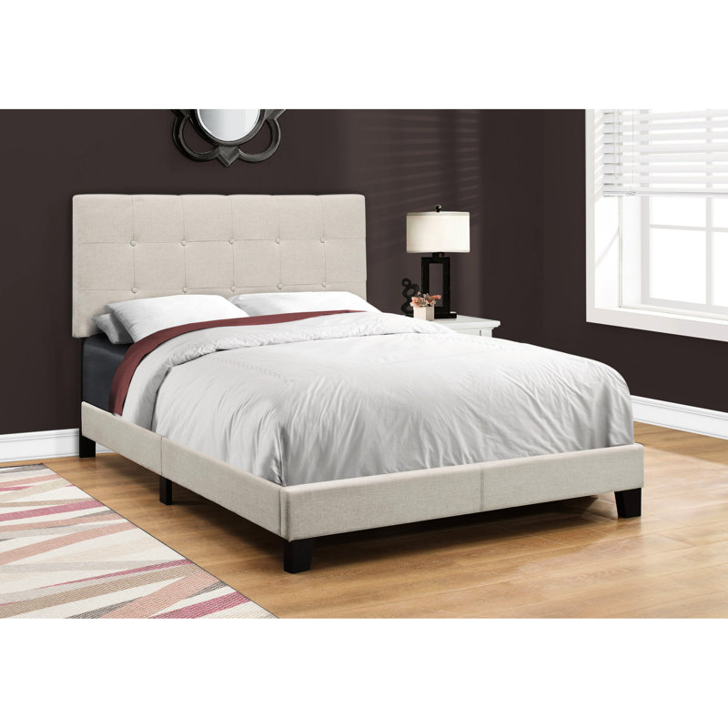 Lit double rembourré en lin beige avec pieds noirs sécurisés