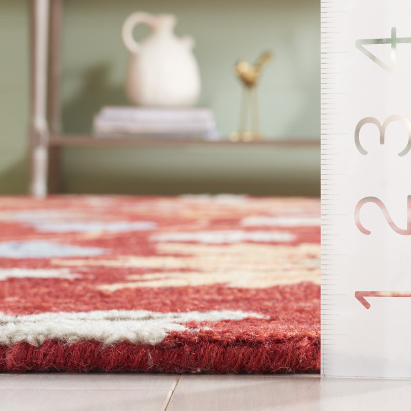 Handmade Red and Orange Floral Wool Area Rug, 5' x 8'