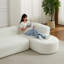 Canapé modulaire de luxe, tissu chenille, courbe moderne, confort de salon
