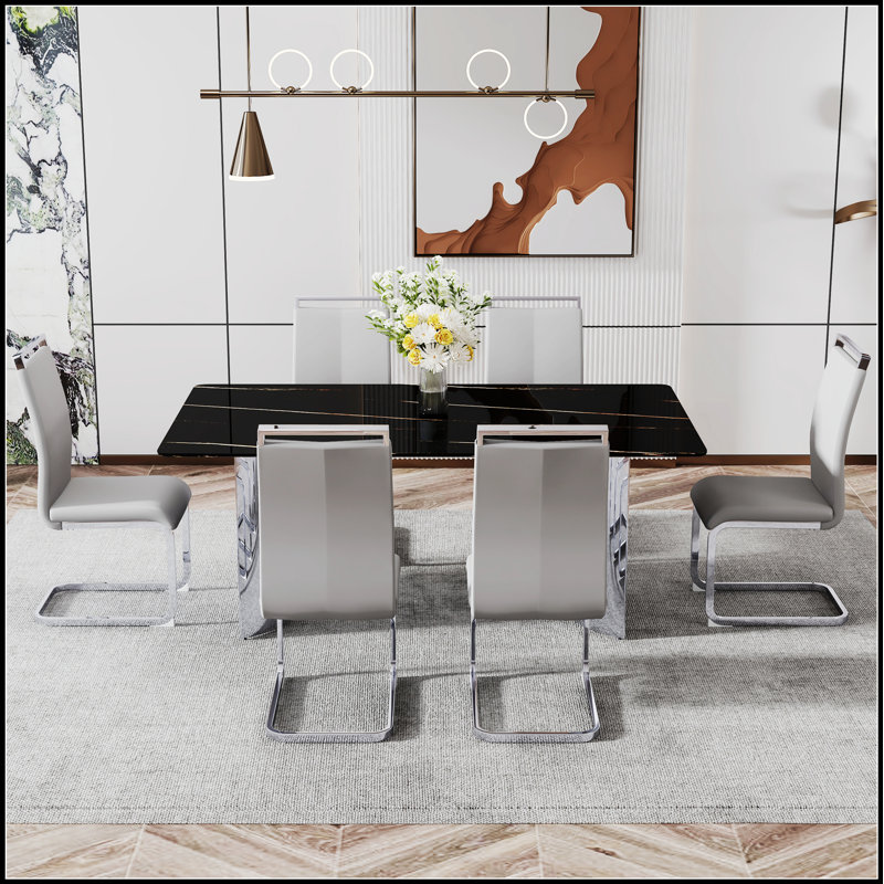 Table de salle à manger moderne et minimaliste avec verre imitation marbre noir, résistante à la chaleur et spacieuse pour des rassemblements élégants.